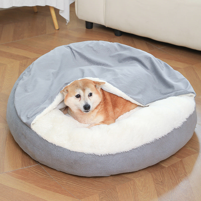 Shiba Inu peering out from inside grey hooded cave dog bed — plush white interior visible